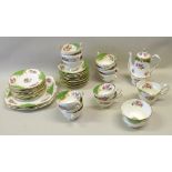 A PARAGON BONE CHINA ROCKINGHAM PATTERN FLORAL AND GREEN PART TEASET OF 41 PIECES AND A HAMILTON