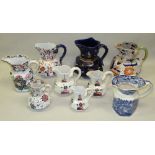 A MASON'S IRONSTONE VISTA PATTERN OCTAGONAL JUG AND EIGHT OTHER SMILAR SHAPED JUGS [9]