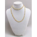 A GOLD FIGARO CHAIN NECKLACE STAMPED 9KT ITALY, LENGTH 71 cm (9.1g)