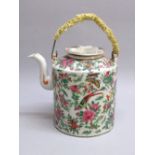 A LATE C19th CHINESE CANTON PORCELAIN CYLINDRICAL TEAPOT PAINTED WITH ALL OVER FLORAL, BIRD AND