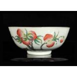 A polychrome porcelain bowl with a decor of peaches. Marked with four-character mark Shendetang Zhi.