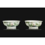 A pair of polychrome porcelain bowls with on the inner side a decor of Wu Fu and on the exterior a