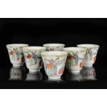 Lot of six polychrome porcelain cups with a decor of figures and a horse. Marked with seal mark