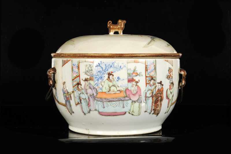 A polychrome porcelain tureen with cover and inner bowl with a decor of a court scene in a garden.