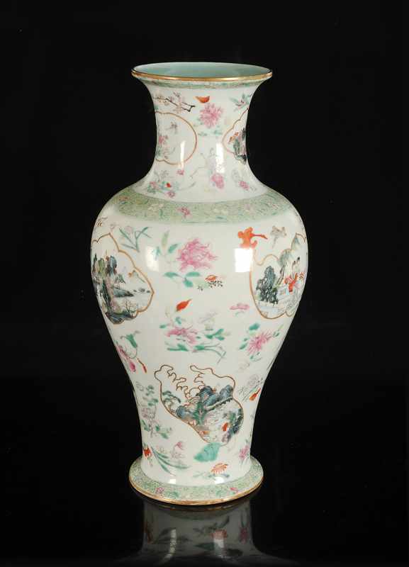 A polychrome porcelain baluster vase with a decor of medallions with flowers, birds, river landscape