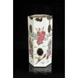 A polychrome porcelain hatstand with a decor of figures. Marked with seal mark Tongzhi. China,