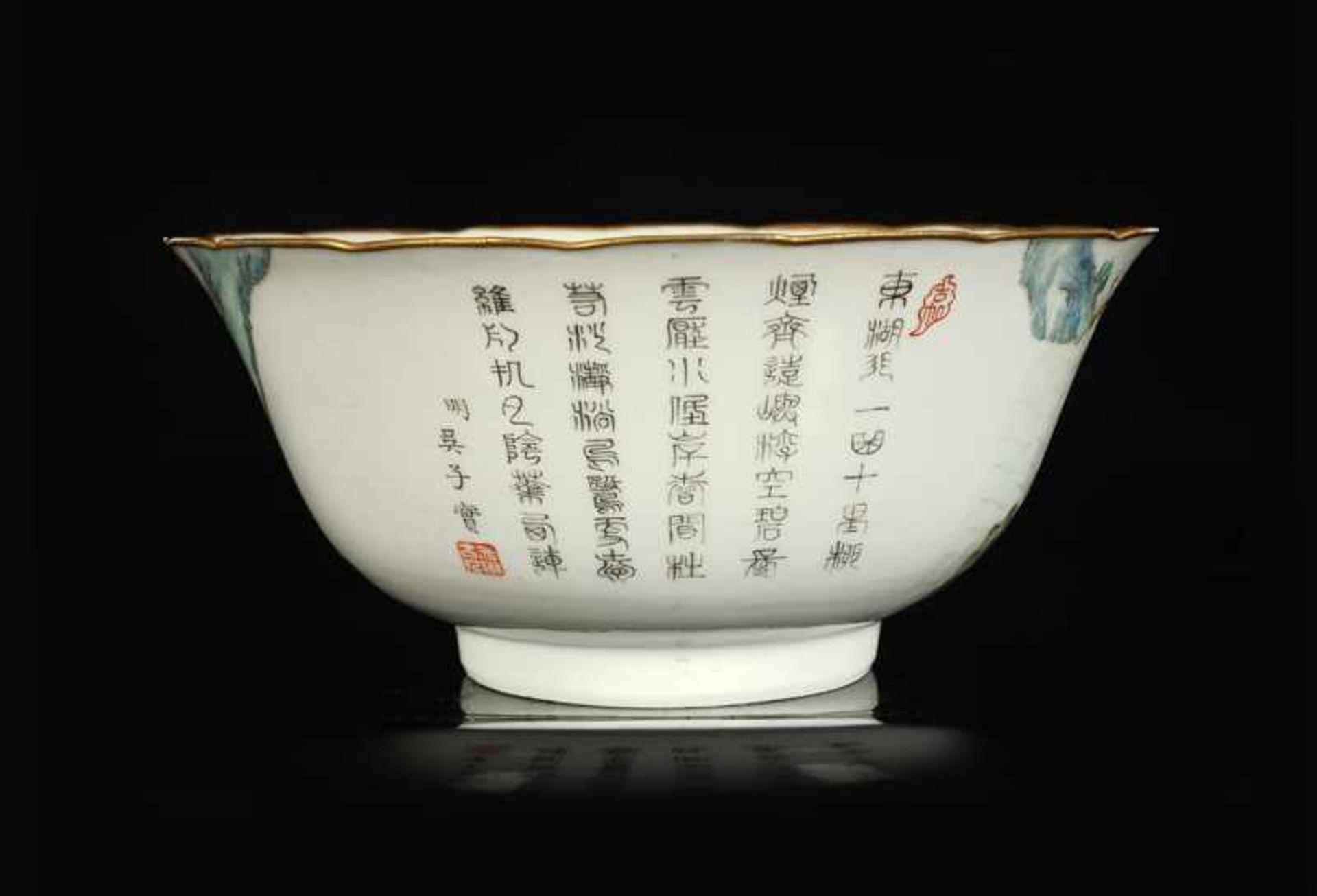 A polychrome porcelain bowl with a decor of a river landscape with a bridge and a poem of Wu - Image 2 of 3