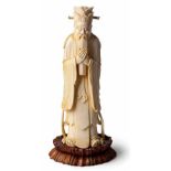 A CHINESE CARVED IVORY FIGURE OF CONFUCIUS, QING DYNASTY, 19TH CENTURY NOT SUITABLE FOR EXPORT