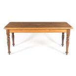 A CAPE YELLOWWOOD AND STINKWOOD TABLE, 20TH CENTURY the moulded rectangular top above a plain