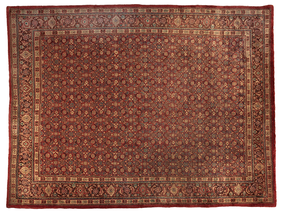 A SAROUK CARPET, PERSIA, MODERN the red field with the overall herati pattern depicted in pale-blue,