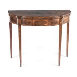 A GEORGE III MAHOGANY TEA TABLE the hinged shaped top above a plain frieze centred by a vacant