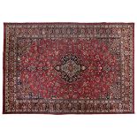 A MESHED CARPET, EAST PERSIA, MODERN the burgundy-red field with a black and blue floral