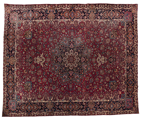 A MESHED CARPET, EAST PERSIA, MODERN the burgundy-red field with a dark-blue and ivory floral