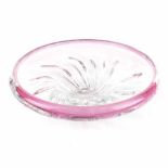 A PINK AND CLEAR GLASS DISH, MODERN the circular floral pattern clear glass decorated with a