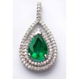 AN EMERALD AND DIAMOND PENDANT centred with a pear-shaped emerald weighing 2.06cts, within a