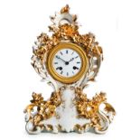 A FRENCH PORCELAIN AND GILT MANTEL CLOCK, CIRCA 1850 BUYERS ARE ADVISED THAT A SERVICE IS