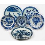 A MISCELLANEOUS COLLECTION OF SIX ASIAN AND CONTINENTAL BLUE AND WHITE CHARGERS each decorated