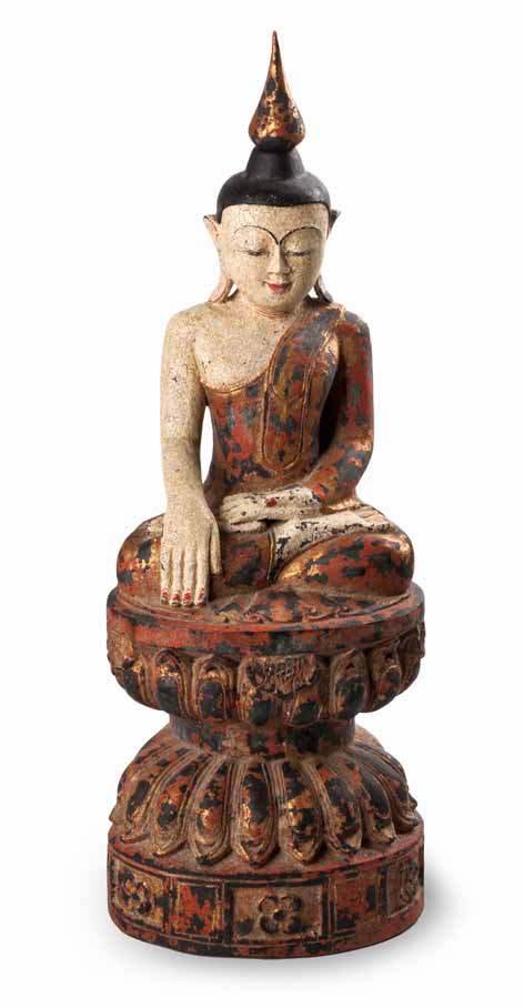 A CARVED WOOD AND PAINTED FIGURE OF A SEATED BUDDHA seated in the lotus position wearing a simple