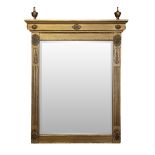 AN ENGLISH GILTWOOD MIRROR the rectangular bevelled plate within a fluted and foliate-carved