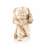 A JAPANESE CARVED IVORY OKIMONO OF BISHAMONTEN, MEIJI, 1868-1912 NOT SUITABLE FOR EXPORT the