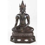 A BRONZE FIGURE OF A SEATED CROWNED AND BEJEWELED BUDDHA, SOUTHEAST ASIA seated in 'dhyanasana'