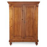 A CAPE PINE CUPBOARD, LATE 19TH CENTURY the outswept cornice above a pair of panelled doors