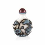 A CHINESE TURQUOISE OVERLAY PEKING GLASS SNUFF BOTTLE each side similarly carved with goldfish and