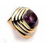 AN AMETHYST DRESS RING, KÖHLER of Art Deco design, centred with a bezel-set cushion-cut amethyst