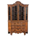 A DUTCH WALNUT AND INLAID DISPLAY CABINET, 19TH CENTURY in two parts, the moulded gabled pediment