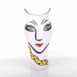 A COSTA BODA GLASS VASE the shaped body painted with a face and a yellow snake 35cm high