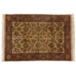 AN INDO-PERSIAN RUG, MODERN the ivory field with an overall design, multi-coloured palmettes with