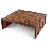 A BRAZILIAN ROSEWOOD, JACARANDA AND MAHOGANY BRUTALIST TABLE DESIGNED BY PERCIVAL LAFER the top