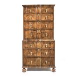 A WALNUT CHEST-ON-CHEST, 20TH CENTURY the shaped rectangular top above four long graduating drawers,