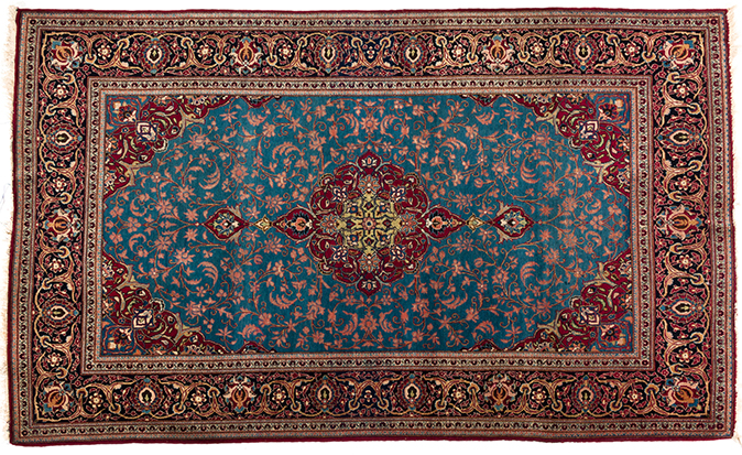 A KESHAN PART SILK RUG, PERSIA, MODERN the sky-blue field with a floral red and green medallion