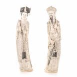 A PAIR OF CHINESE CARVED IVORY EMPEROR AND EMPRESS FIGURES NOT SUITABLE FOR EXPORT each standing,