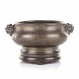 A CHINESE BRONZE CENSER AND STAND the baluster body applied with a pair of handles in the form of