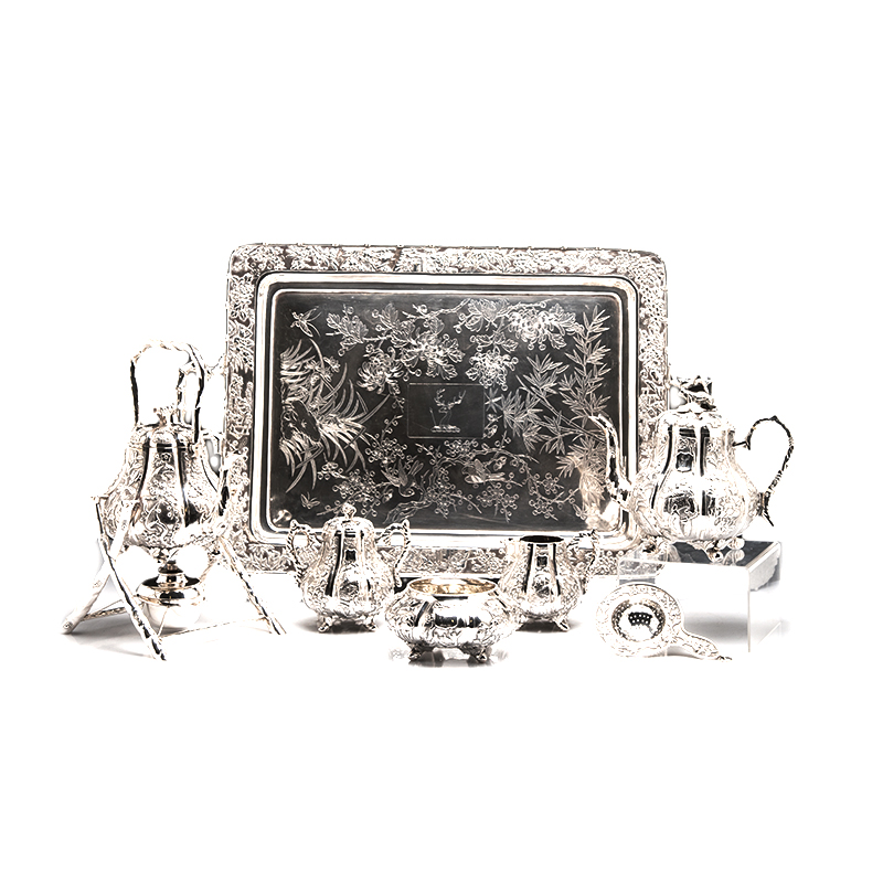 A CHINESE EXPORT SILVER TEA SERVICE, WO SHING, CIRCA 1900 NOT SUITABLE FOR EXPORT comprising: a