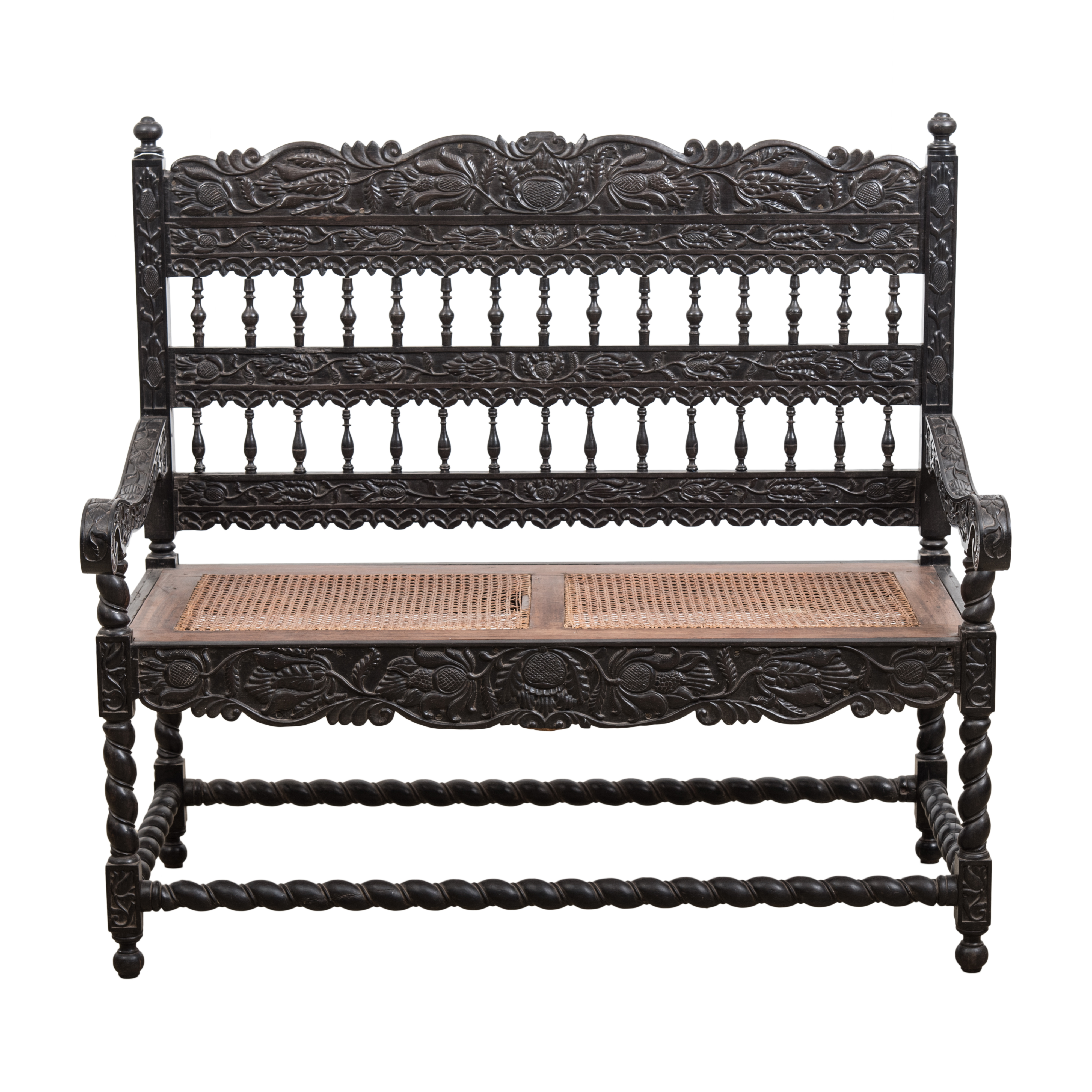 AN EBONY BENCH, 19TH CENTURY the shaped, foliate carved top, mid and bottom rails joined by turned