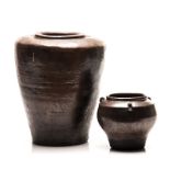 A BROWN MARTAVAN STYLE POT, 19TH CENTURY of tapering cylindrical form; and a small martavan style