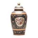 A CHINESE FAMILLE ROSE AND BLUE URN WITH COVER, QIANLONG (1736-1795) the tapering baluster body