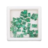 A MISCELLANEOUS COLLECTION OF UNMOUNTED CARRE- AND EMERALD-CUT EMERALDS weighing approximately 5.