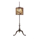 A VICTORIAN MAHOGANY POLE FIRE SCREEN the square tapestry within a conforming frame surmounted by