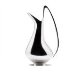 A DANISH SILVER WATER PITCHER, MODEL NO. 1052, DESIGNED BY HENNING KOPPEL FOR GEORG JENSEN,