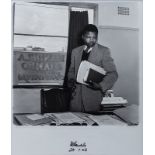 Jurgen Schadeberg (South African 1931-) MANDELA IN HIS LAW OFFICE archival silver selenium print,