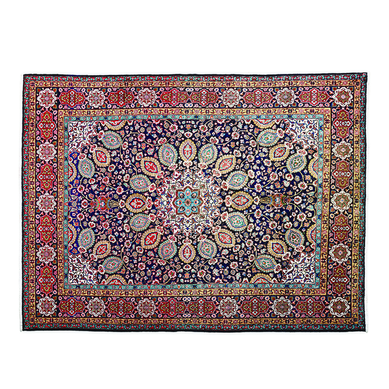 A TABRIZ CARPET, NORTH WEST PERSIA, MODERN the deep indigo-blue field with an ivory floral star