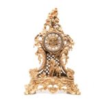 A FRENCH ORMOLU MANTEL CLOCK, 19TH CENTURY the 10,5cm gold dial with raised enamel Roman hour