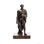 A BRONZE FIGURAL SCULPTURE OF NAPOLEON BONAPARTE standing with hand in waistcoat, holding a scroll