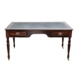 A VICTORIAN-STYLE MAHOGANY WRITING TABLE the rectangular top with gilt-tooled leather inset