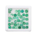 A MISCELLANEOUS COLLECTION OF UNMOUNTED CIRCULAR MIXED-CUT EMERALDS weighing approximately 5.35cts