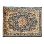 A KHOROSSAN CARPET, PERSIA, MODERN the blue field with a pale blue and gold floral star medallion,